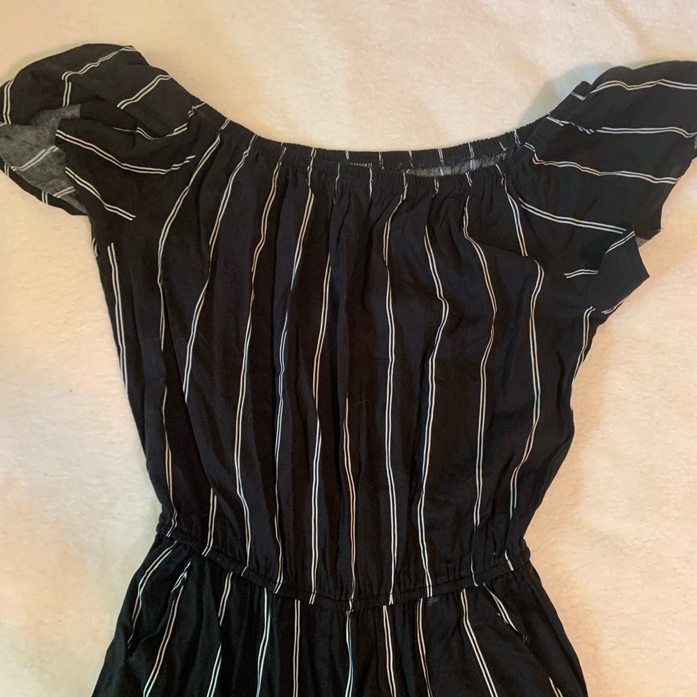 Black and White Striped Off-Shoulder Jumpsuit.